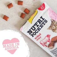 عکس اسنک تشویقی بالشتی مغزدار GimCat مدل Nutri Pockets تهیه شده از گوشت گاو مخصوص گربه - 60 گرم